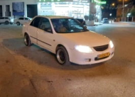 مازدا | MAZDA 323 2004